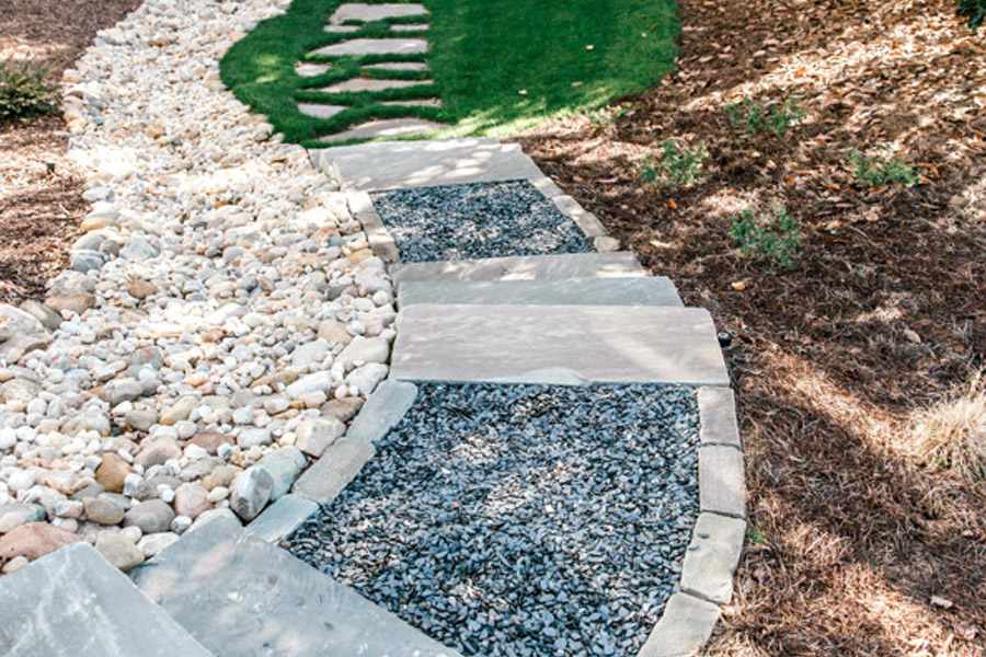 Stone garden pathway with gravel and decorative rocks in Metro Atlanta
