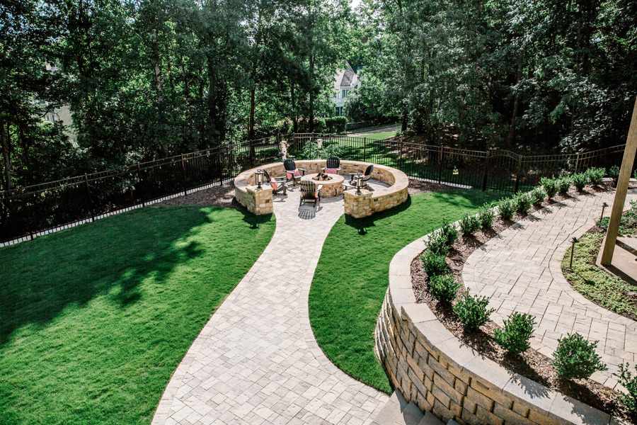 Backyard patio with fire pit and circular seating area in Metro Atlanta